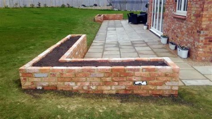 How do you build a raised brick patio