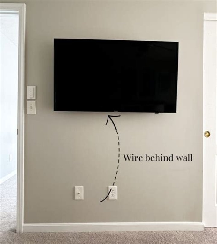How do you hang wires behind drywall