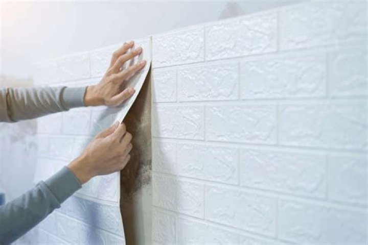 How do you prepare a wall for peeling and sticking wallpaper