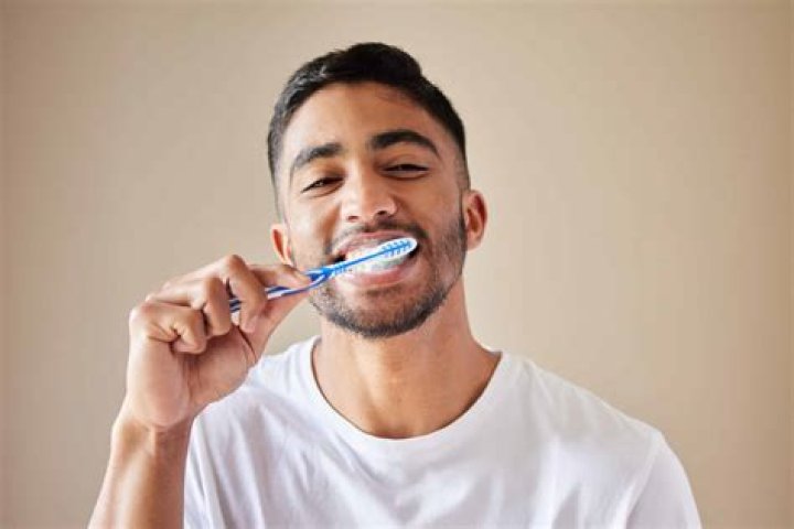 Is it OK to brush without toothpaste