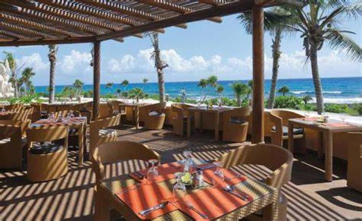 What does premium level get you at Barcelo Maya Palace?