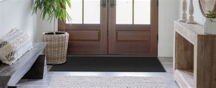 Where should door mats be placed
